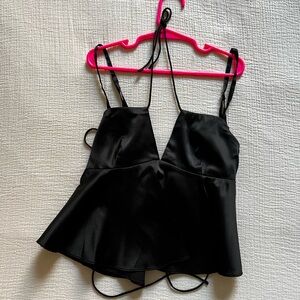 Black revolve top